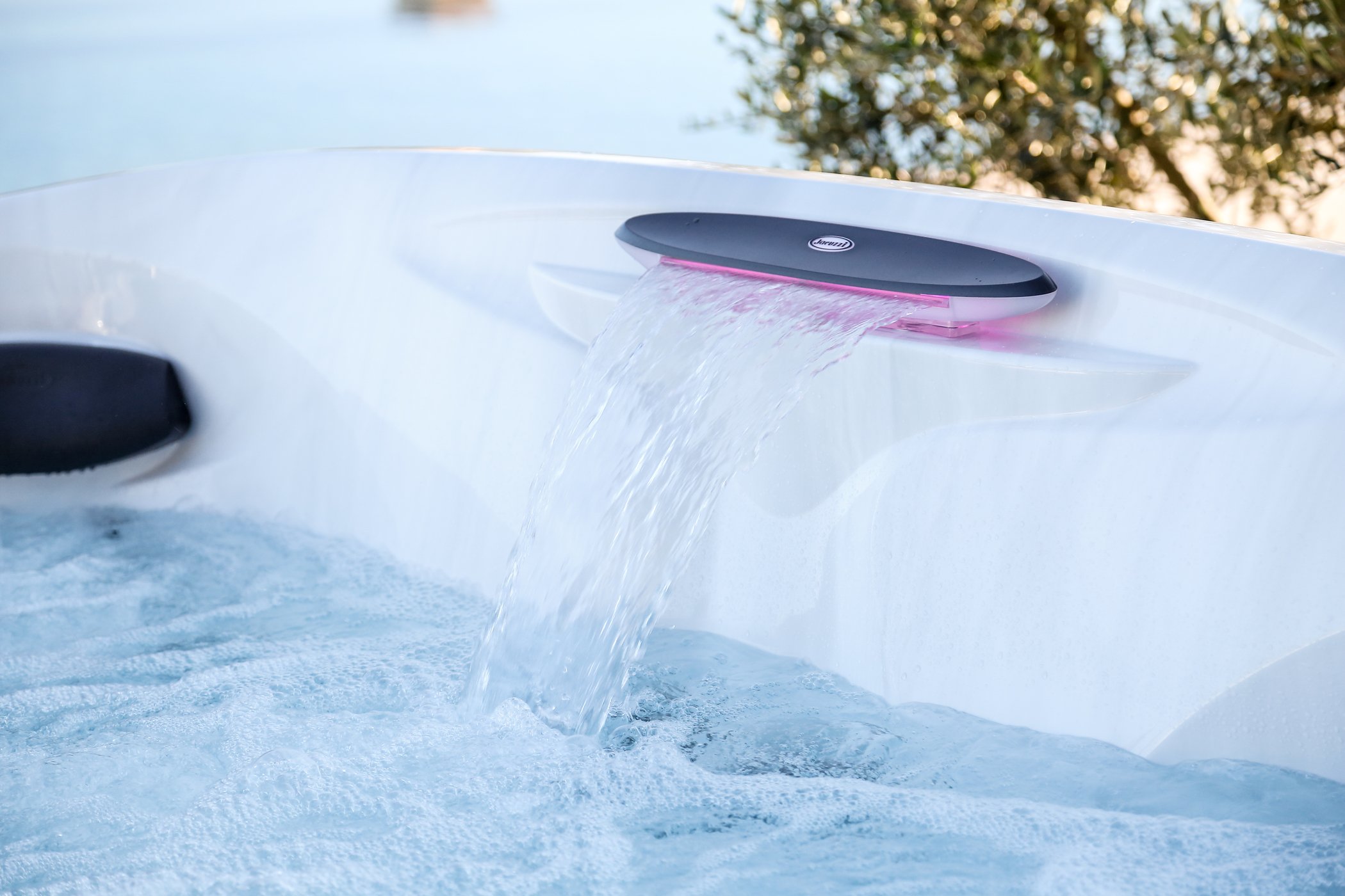 Waterfall in an outdoor hot tub.